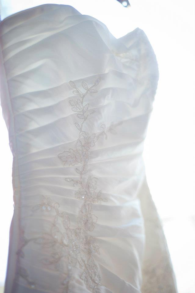 dress hanging on the window at the beach estate